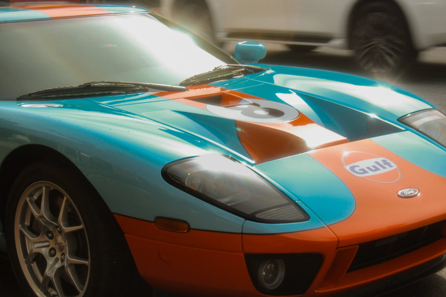 Turquoise and orange Gulf-liveried Ford GT in bright sunlight, photographed by Jordan Lombard